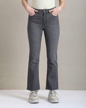 women washed bootcut jeans