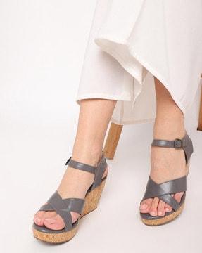 women wedges with buckle fastening