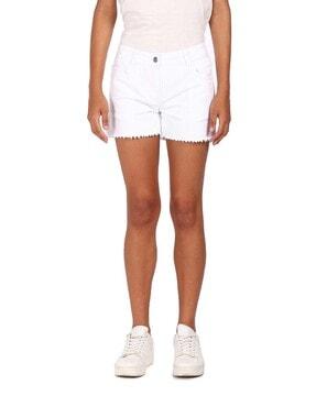 women white mid rise raw hem shorts