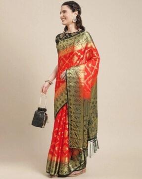 women woven saree with contrast & tasselled border