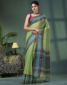 women woven saree with contrast border