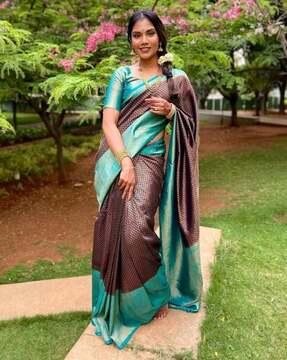 women woven saree with contrast border