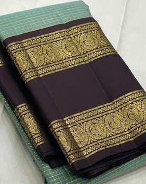 women woven saree with contrast border