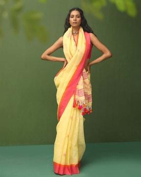 women woven saree with contrast striped pallu