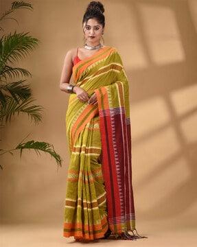 women woven saree with tassels