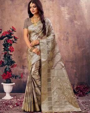 women woven saree with tassels