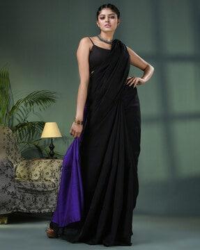 women woven saree with tassels