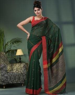 women woven saree with tassels