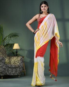 women woven saree with tassels