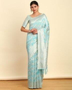 women woven saree with tassels