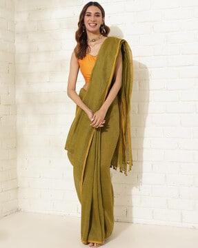 women woven saree with tassels