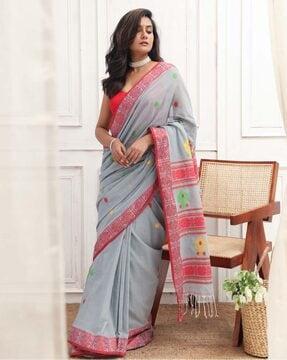 women woven saree with tassels