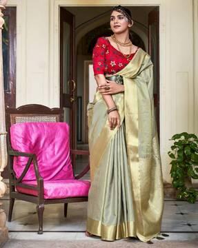 women woven saree with zari border