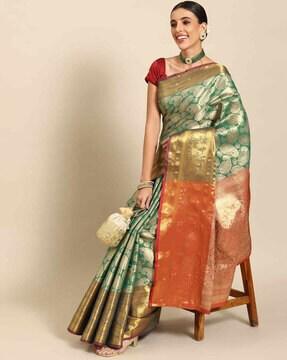 women woven saree with zari border