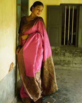 women woven saree with zari border