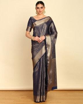 women woven saree with zari border