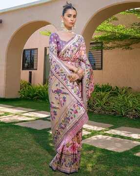 women woven saree with zari border