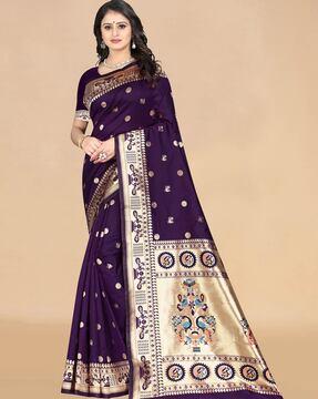 women woven saree with zari border