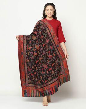 women woven shawl with fringed detail