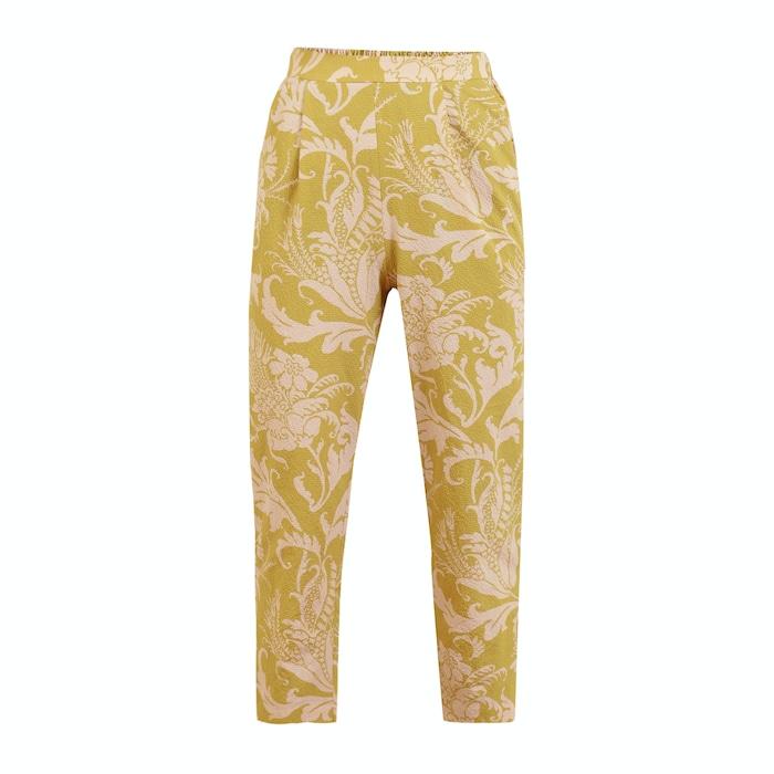 women yellow all-over printed carrot-leg trousers