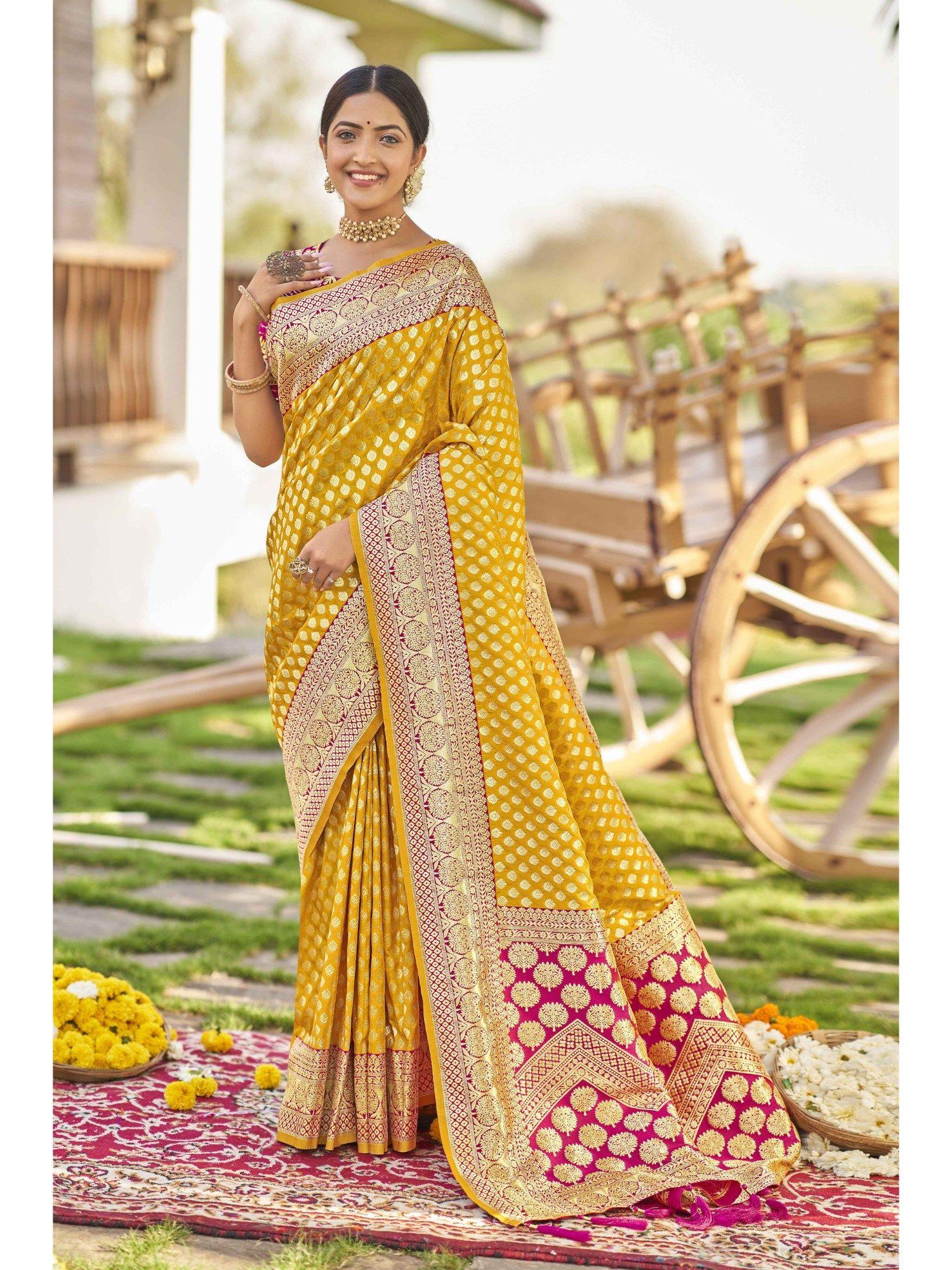 women yellow and pink woven banarasi silk saree with unstitched blouse