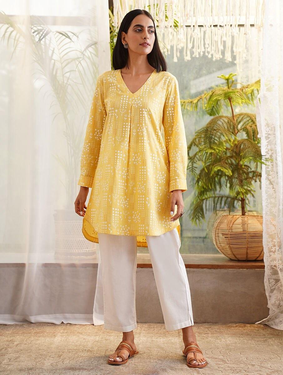 women yellow cotton printed v neck regular fit tunics