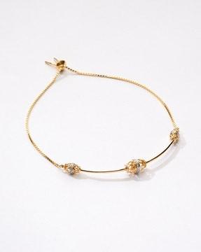 women yellow gold canister charm diamond bracelet