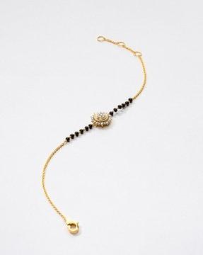 women yellow gold cluster floral bracelet