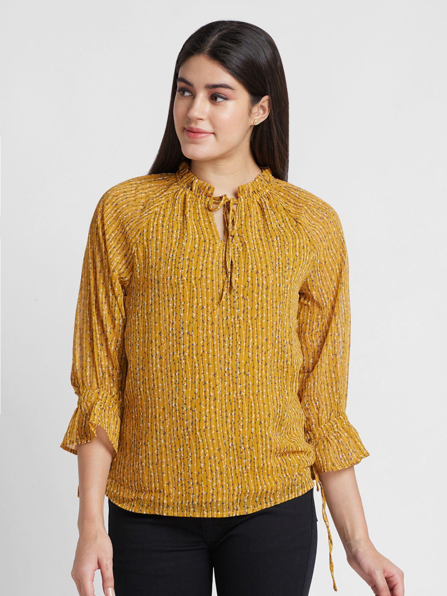 women yellow printed tie-up neck top