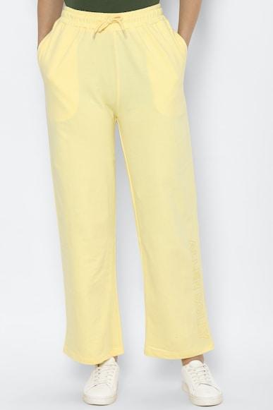 women yellow regular fit solid casual trousers