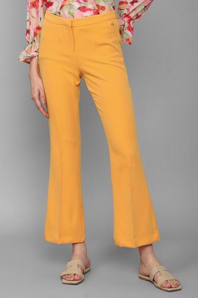 women yellow regular fit solid casual trousers