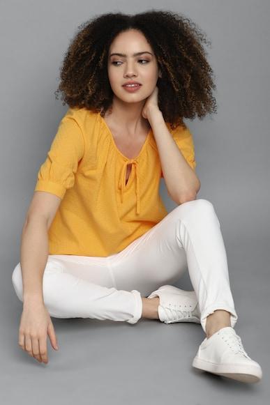 women yellow textured short sleeves tunic