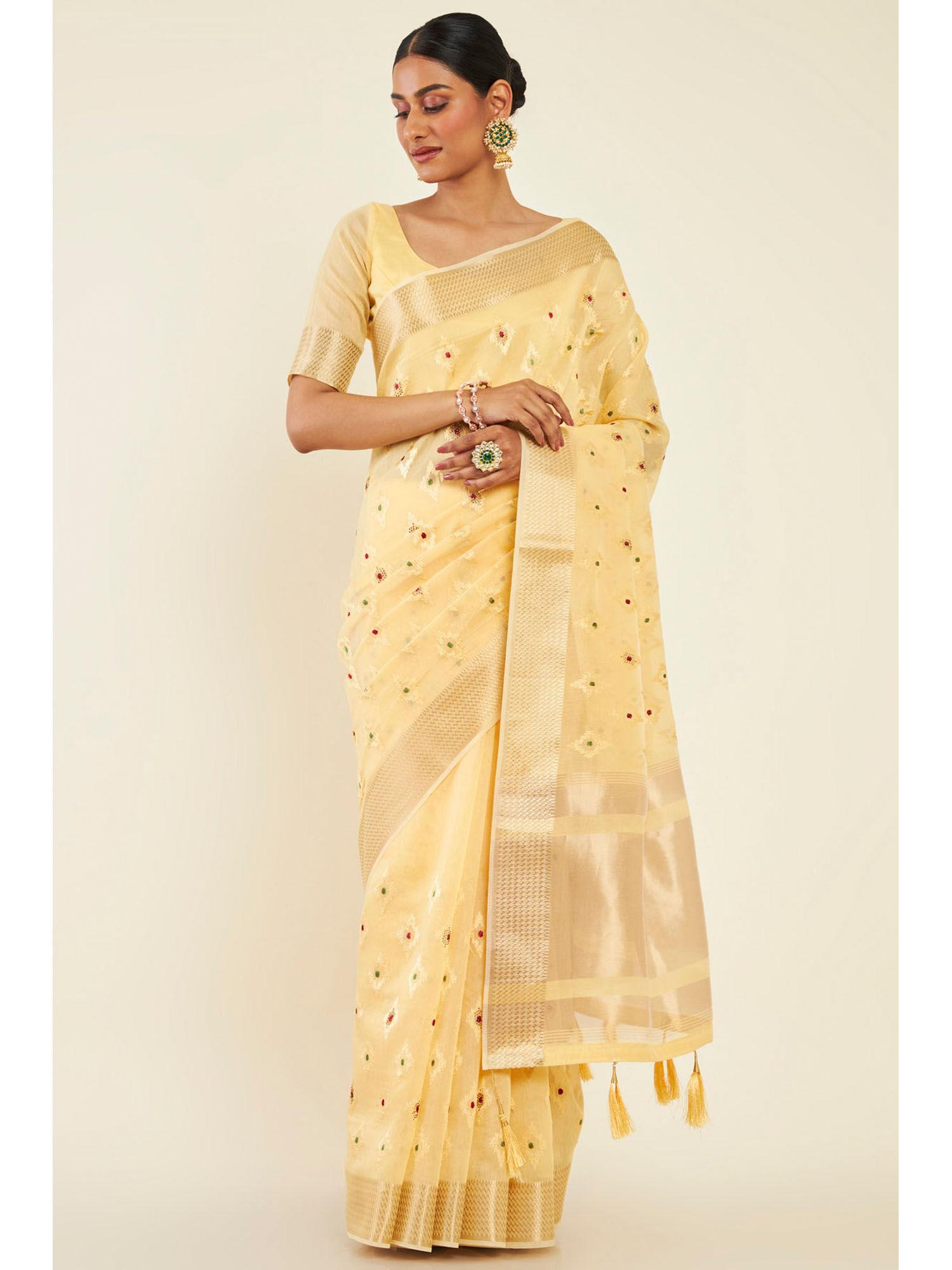 women yellow tissue embroidered saree with unstitched