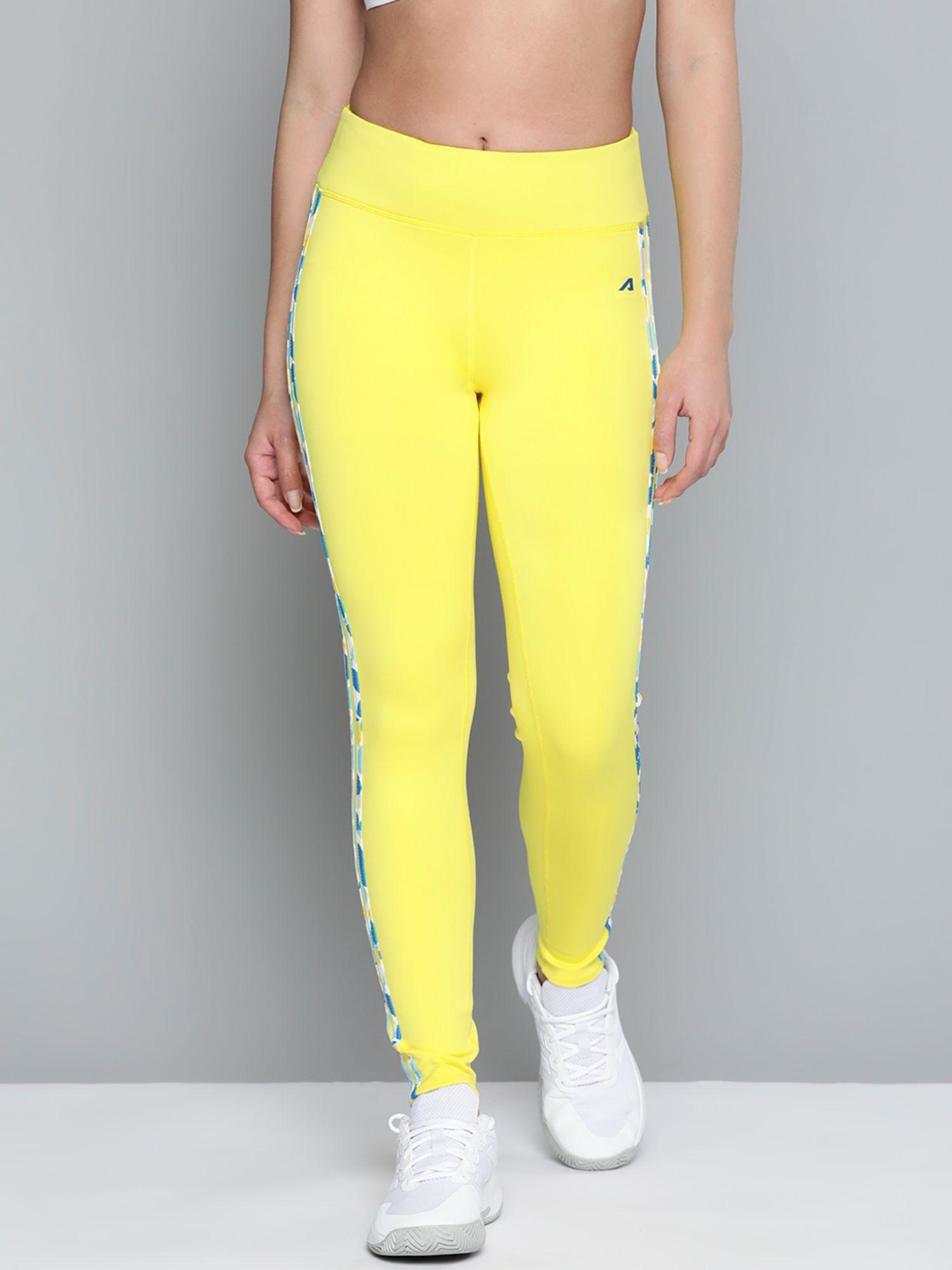 women yellow white striped sports tights