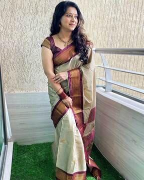 women zari woven saree with contrast border