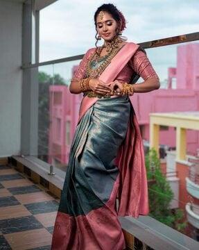 women zari woven saree with contrast border
