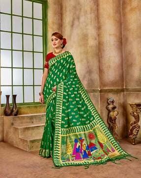 women zari woven saree with tassels