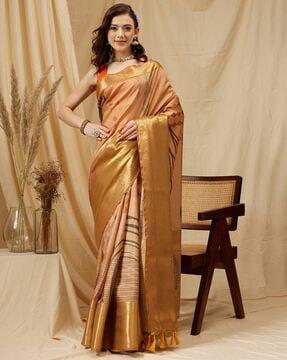 women zari woven saree with tassels