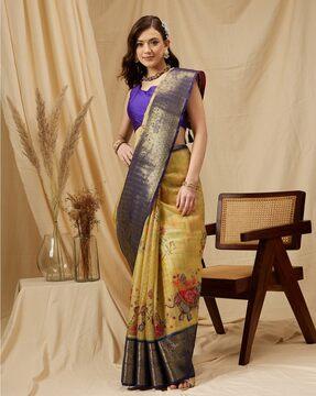 women zari woven saree with tassels