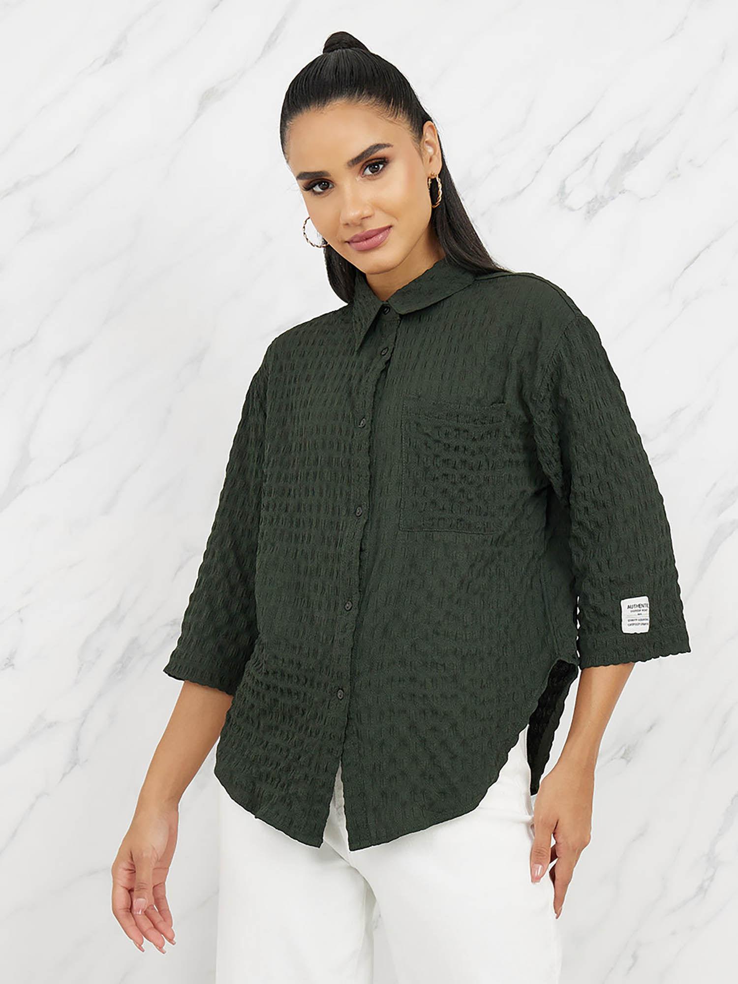womens dark green oversized textured curved hem shirt with patch detail