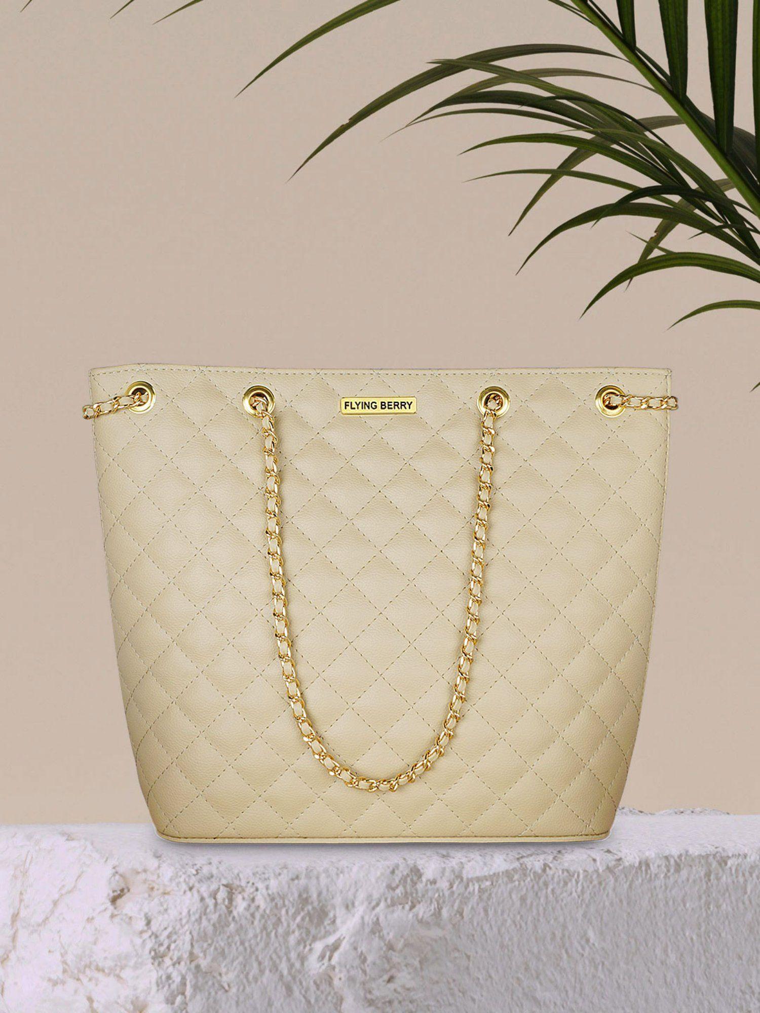 womens beige hand bag