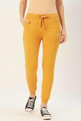 womens regular fit solid trackpants - mustard