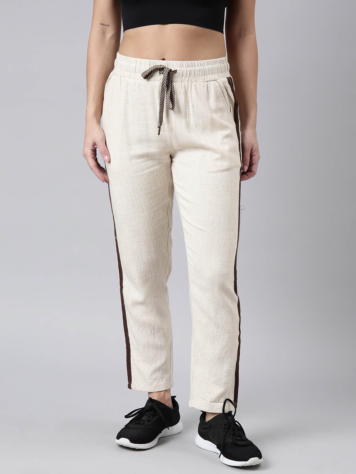 womens solid slim fit cream regular track pants