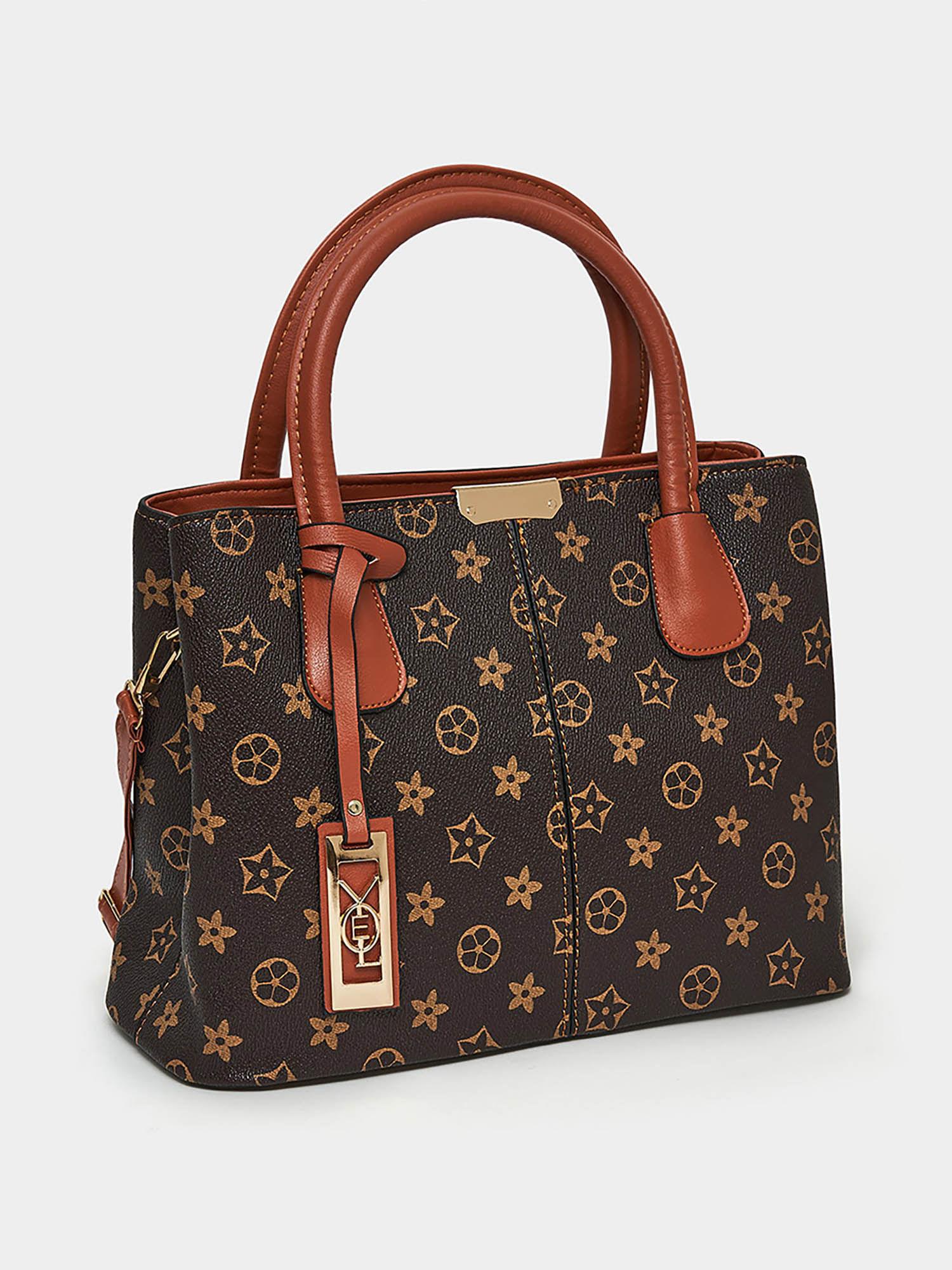 womens tan all over print handbag