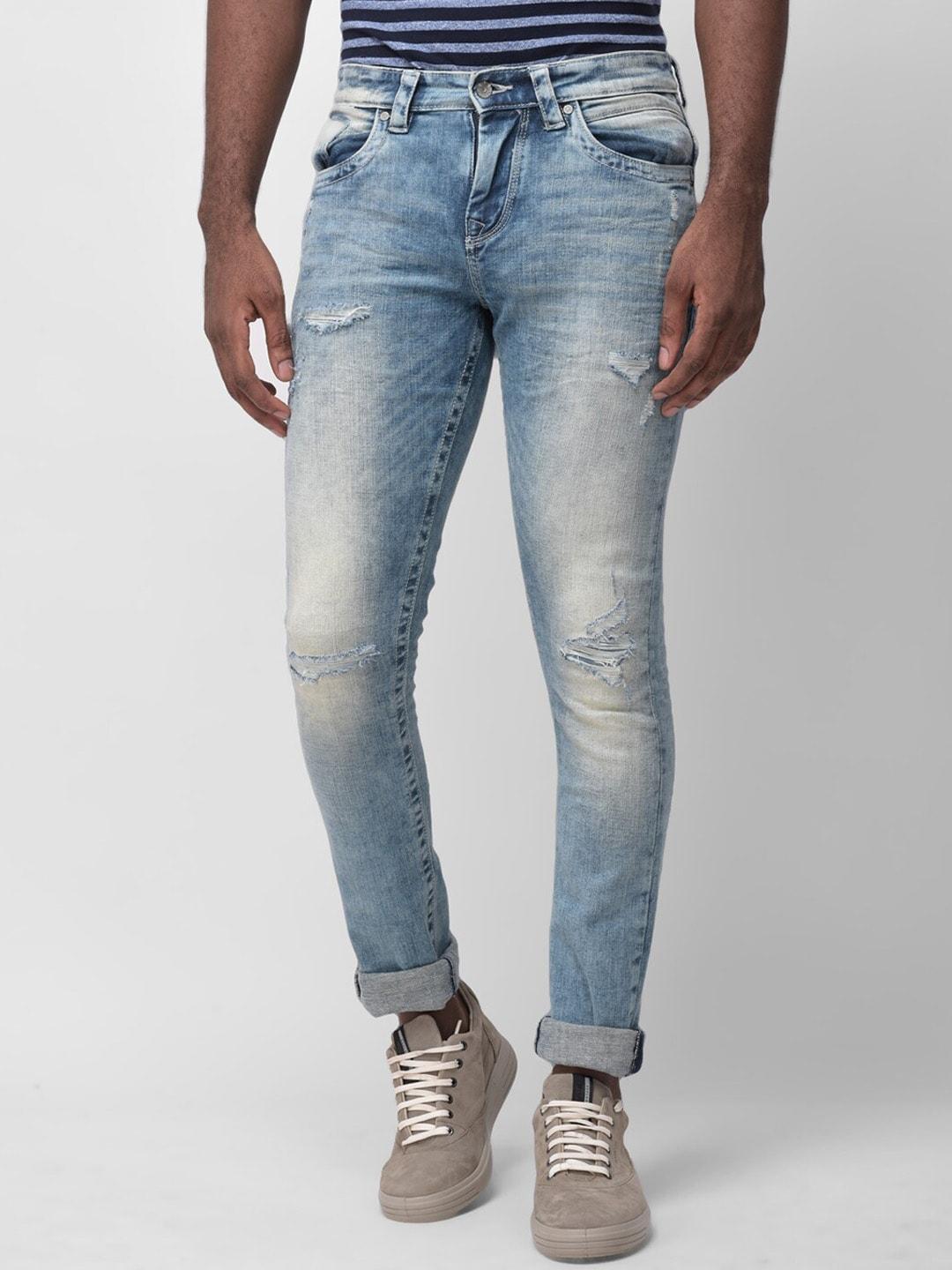 woodland-men-blue-slim-fit-mildly-distressed-heavy-fade-jeans