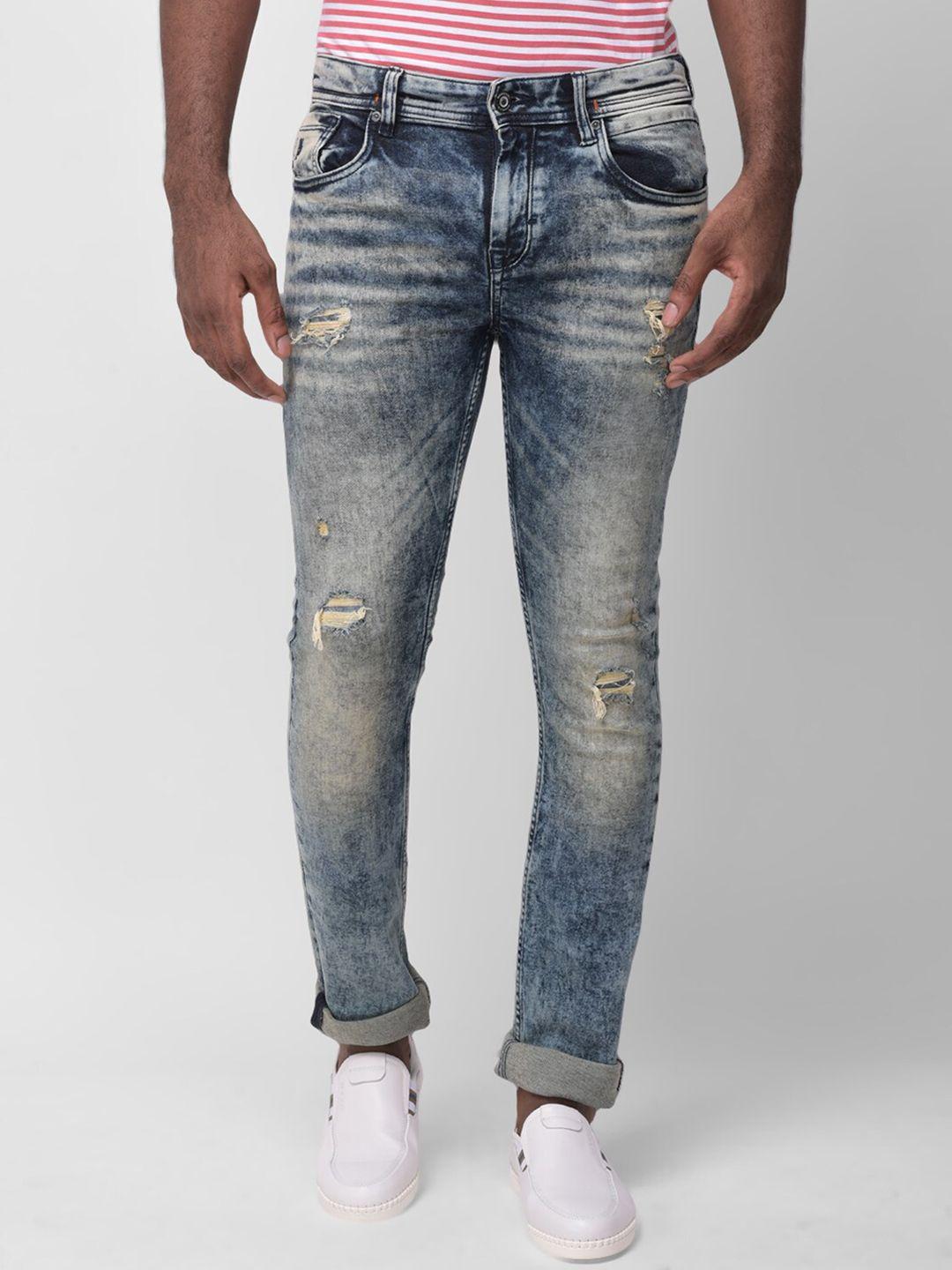 woodland men blue slim fit mildly distressed heavy fade stretchable jeans