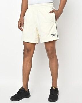 woven shorts with insert pockets