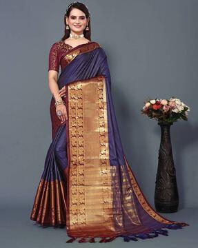 woven banarasi aura silk saree with tassels