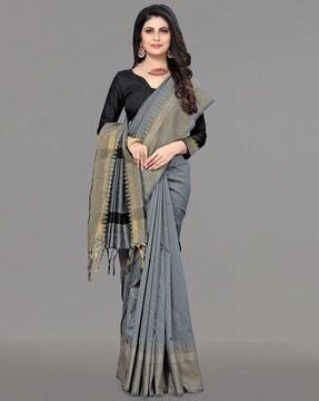 woven design traditional saree with tassels