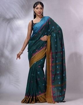 woven motifs saree with tassels